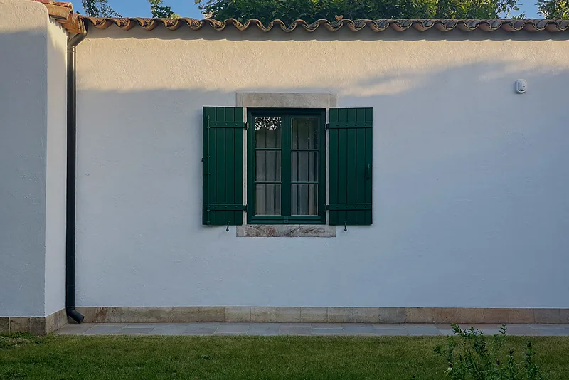 Clean white villa wall